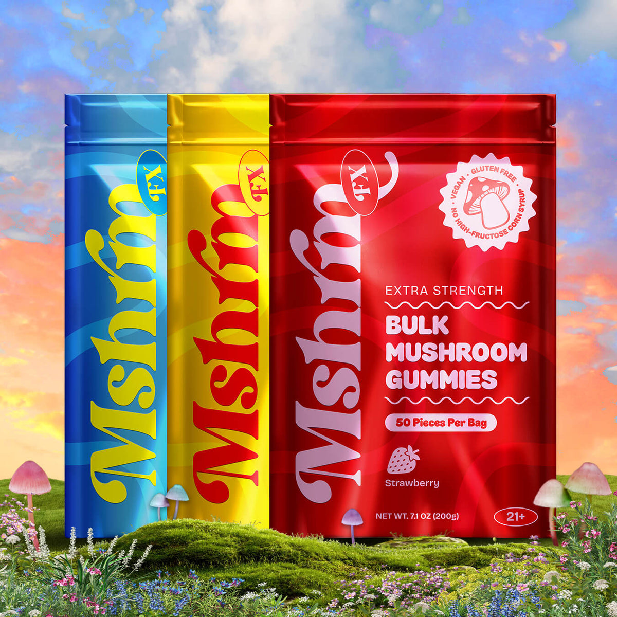 Three MushroomFX Extra Strength Bulk Mushroom Gummies bags standing in grass, 50 count resealable pouches